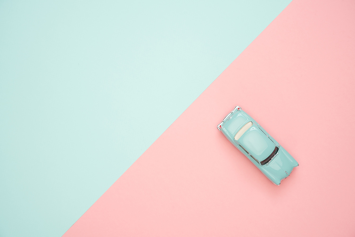  a picture of light blue color and pink also with picture of mini car on it 